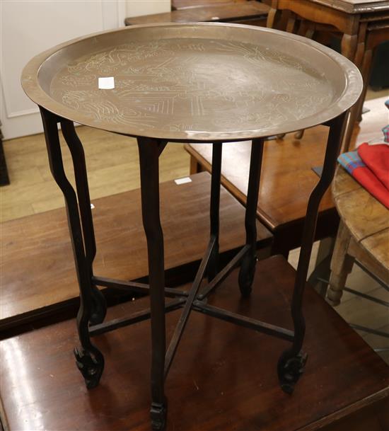 A Chinese brass top folding table W.53cm